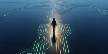 Visão aérea de uma pessoa caminhando por um caminho iluminado e geométrico, simbolizando a jornada da educação financeira e o crescimento estratégico em direção à abundância.